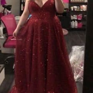 Red sparkly v-neck prom dress